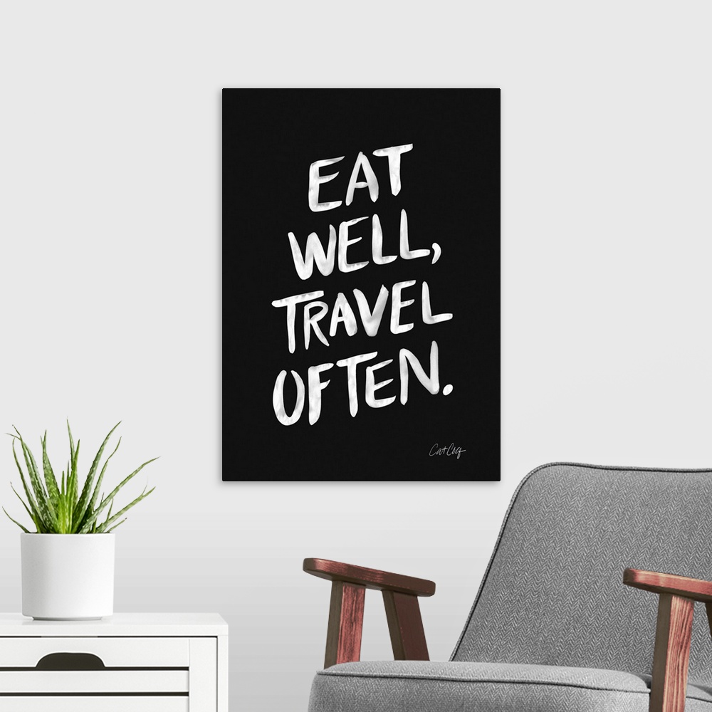 A modern room featuring Eat Well Travel Often