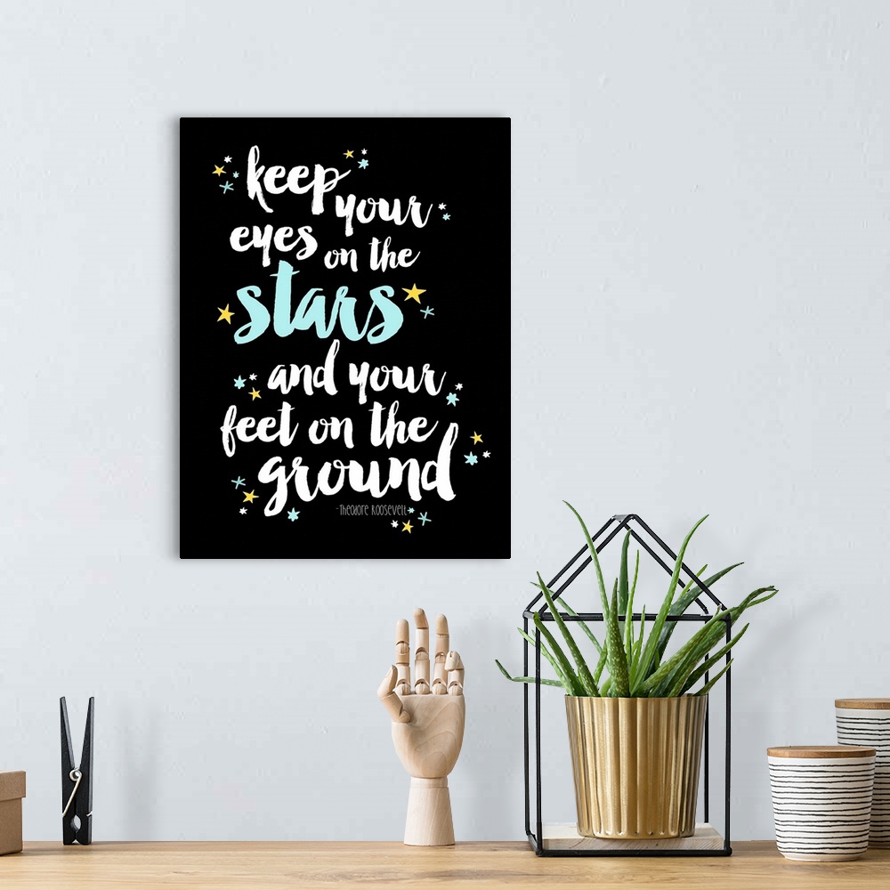 A bohemian room featuring An inspirational quote by Theodore Roosevelt that reads "Keep your eyes on the stars and your fee...