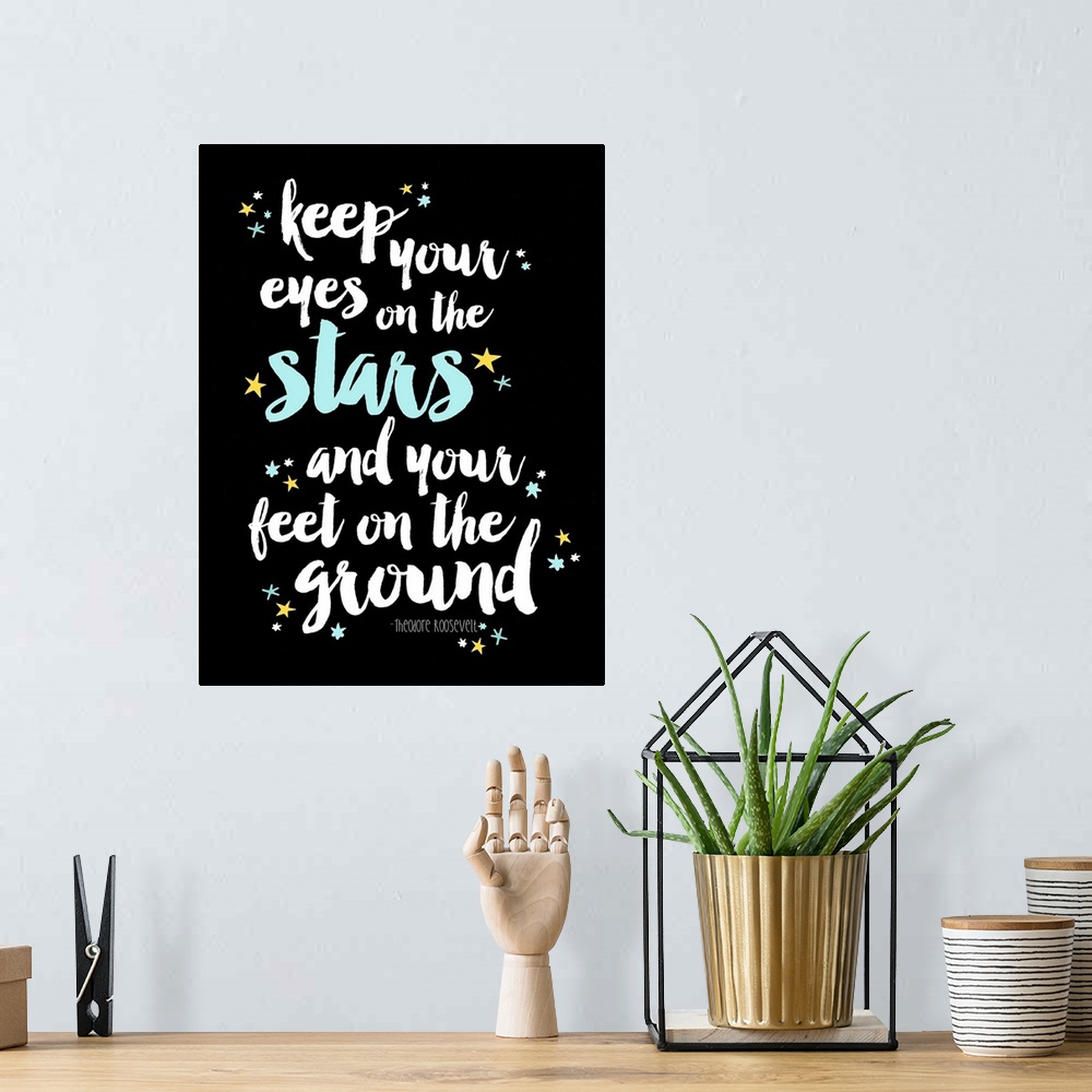 A bohemian room featuring An inspirational quote by Theodore Roosevelt that reads "Keep your eyes on the stars and your fee...