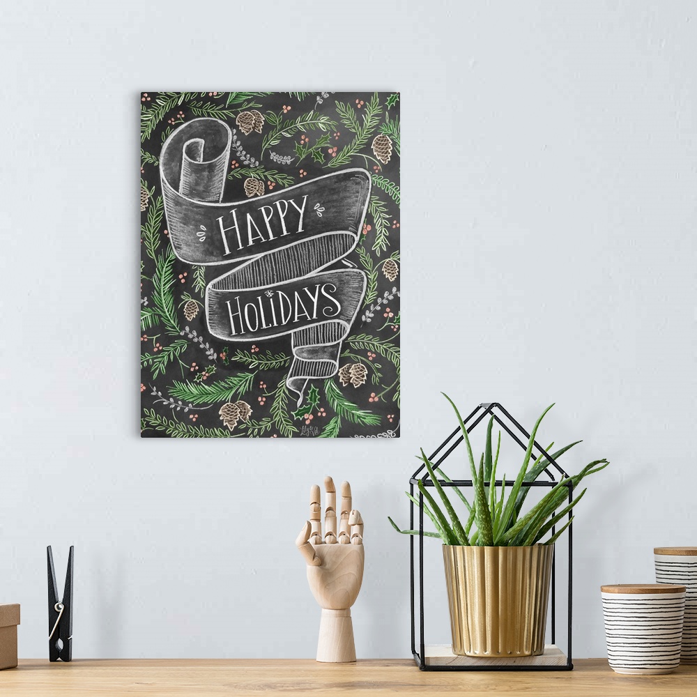 A bohemian room featuring "Happy Holidays" handwritten on a banner and surrounded by pinecones and branches.