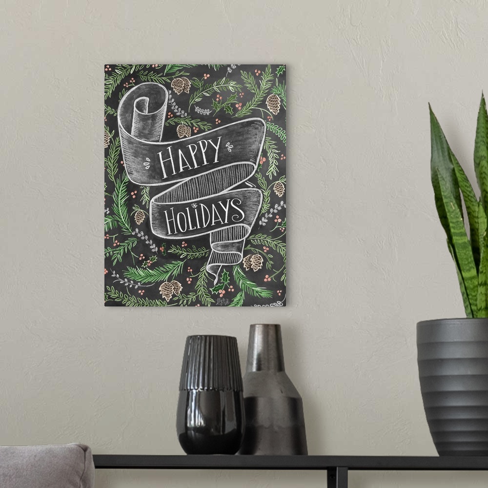 A modern room featuring "Happy Holidays" handwritten on a banner and surrounded by pinecones and branches.