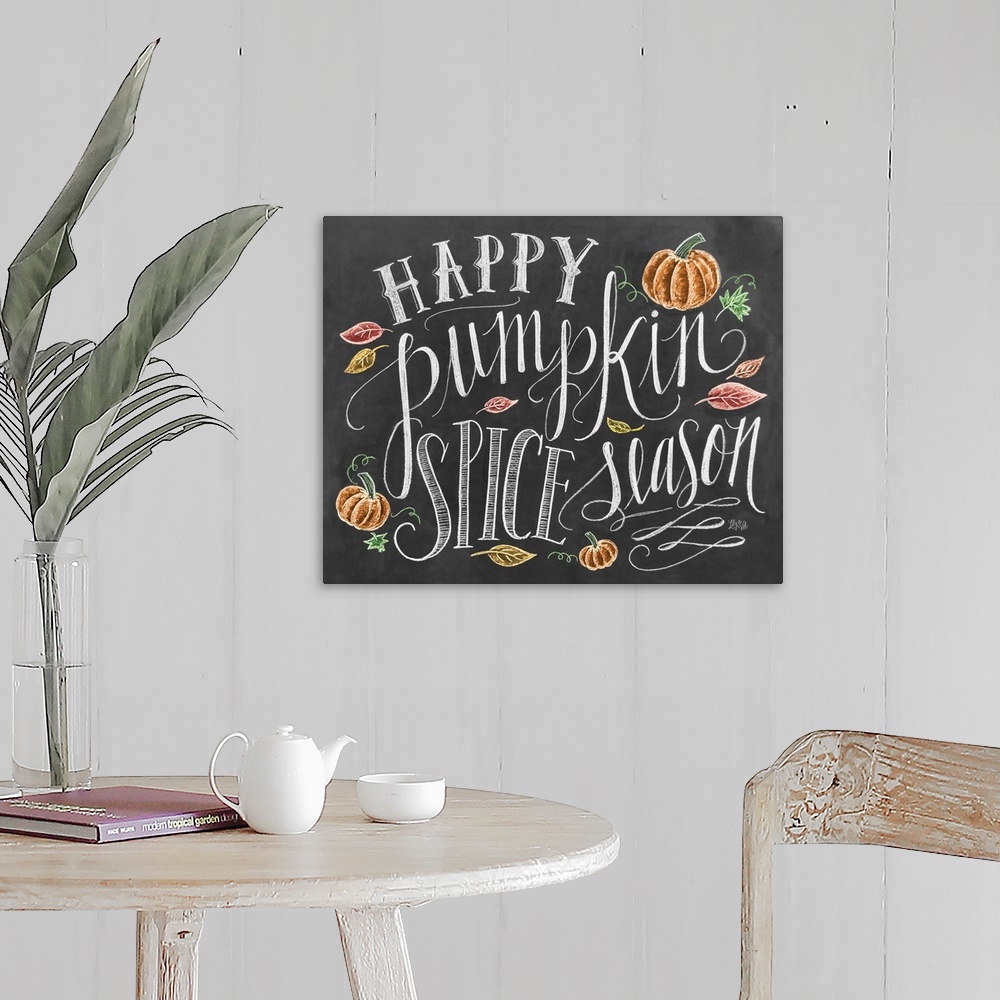 A farmhouse room featuring "Happy pumpkin spice season" handwritten and illustrated with leaves and pumpkins.