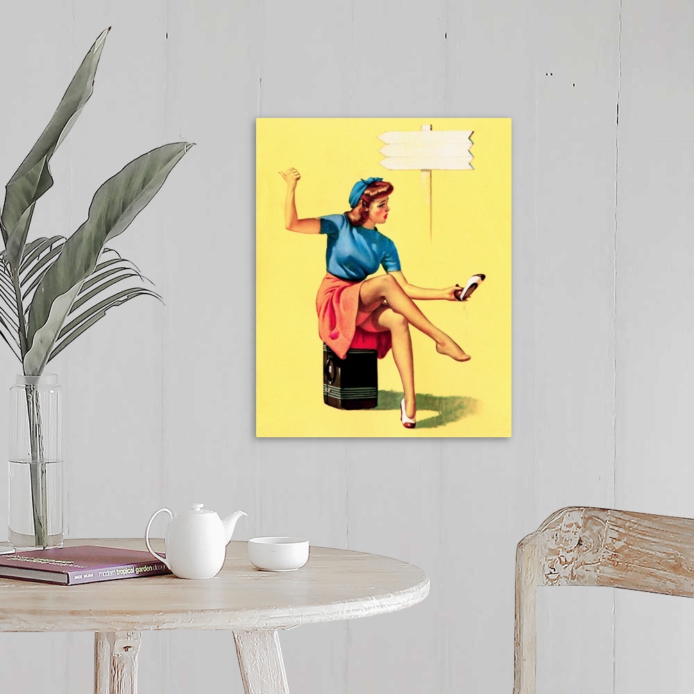 A farmhouse room featuring Vintage 50's illustration of a young woman sitting on her suitcase at the side of the road.