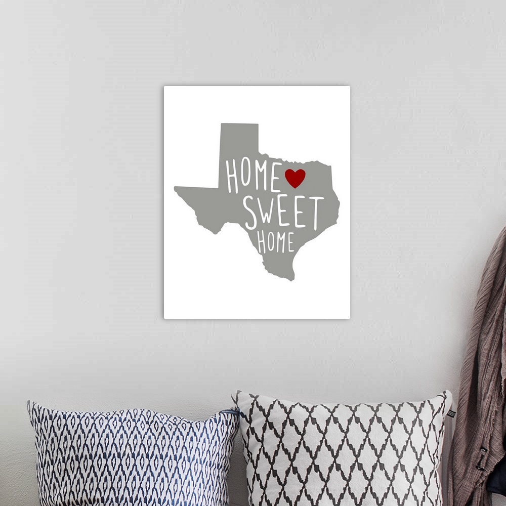 A bohemian room featuring Silhouette of the state of Texas with "Home Sweet Home" and a heart inside.