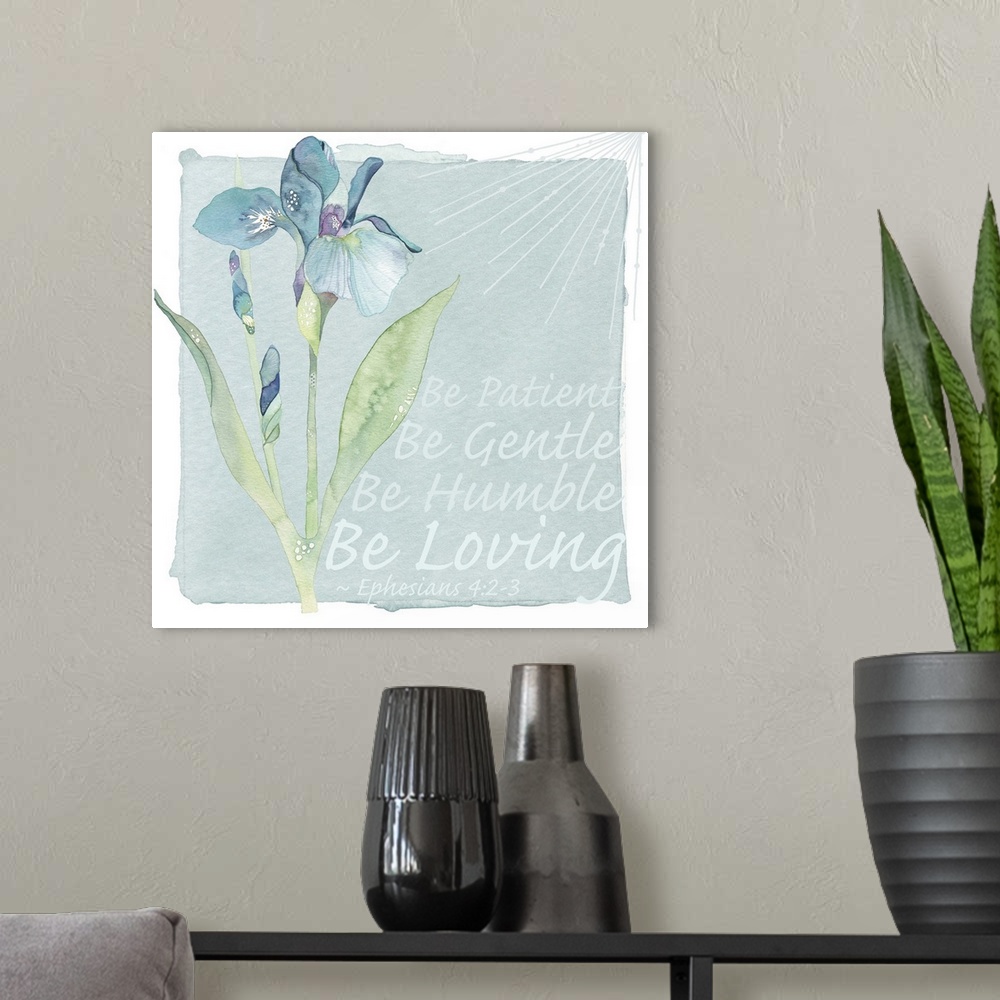 A modern room featuring Decorative watercolor painting of a blue iris with the text "Be patient, be gentle, be humble, be...