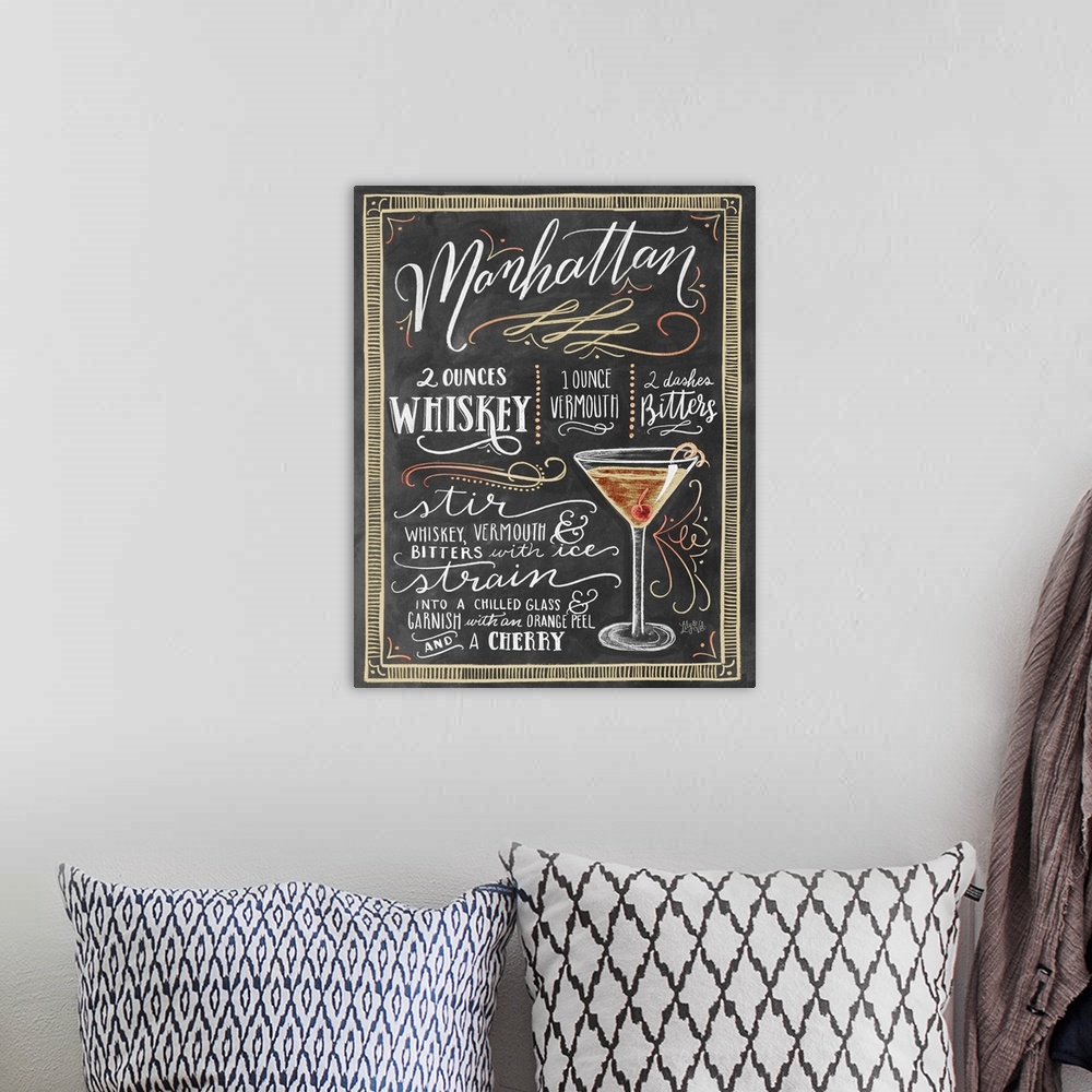 A bohemian room featuring Handlettered recipe for a Manhattan cocktail with the appearance of a chalkboard drawing.