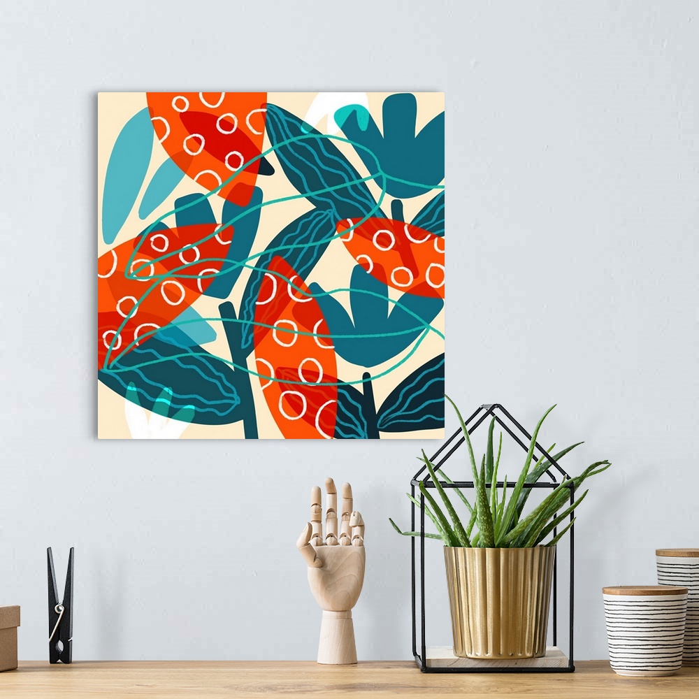 A bohemian room featuring A bold Mid-Century graphic illustration of orange and blue leaves which makes a big statement for...