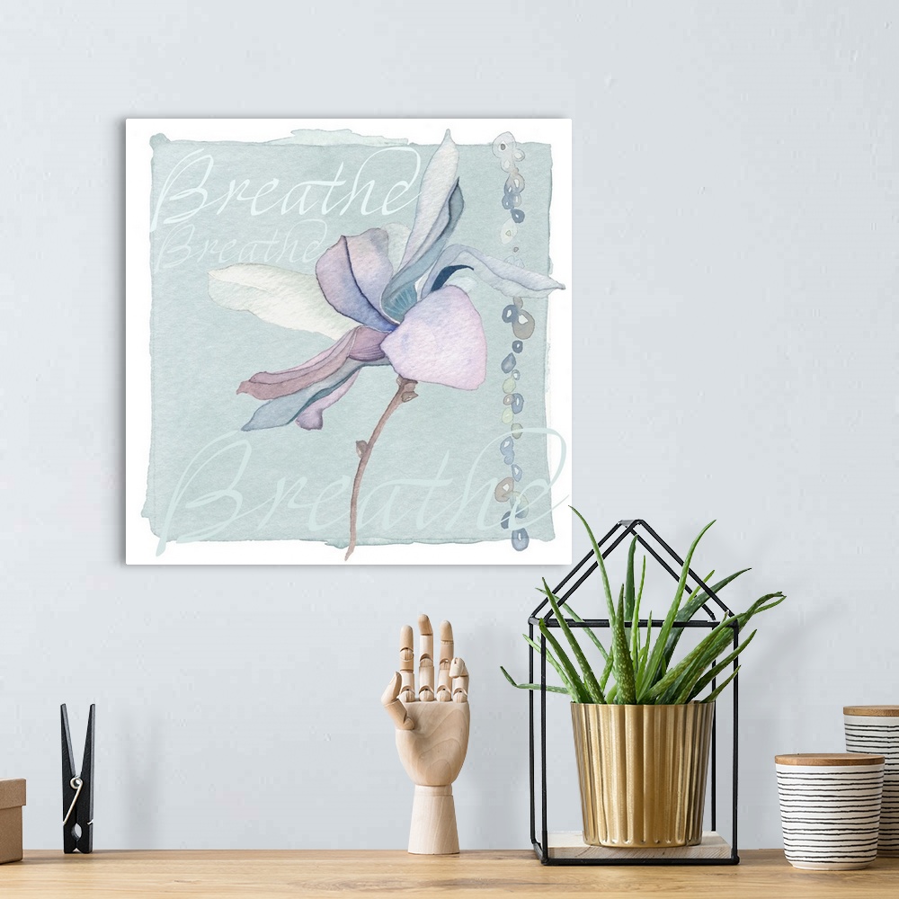 A bohemian room featuring Decorative watercolor painting of a purple lily with the word "Breathe" repeated in the background.