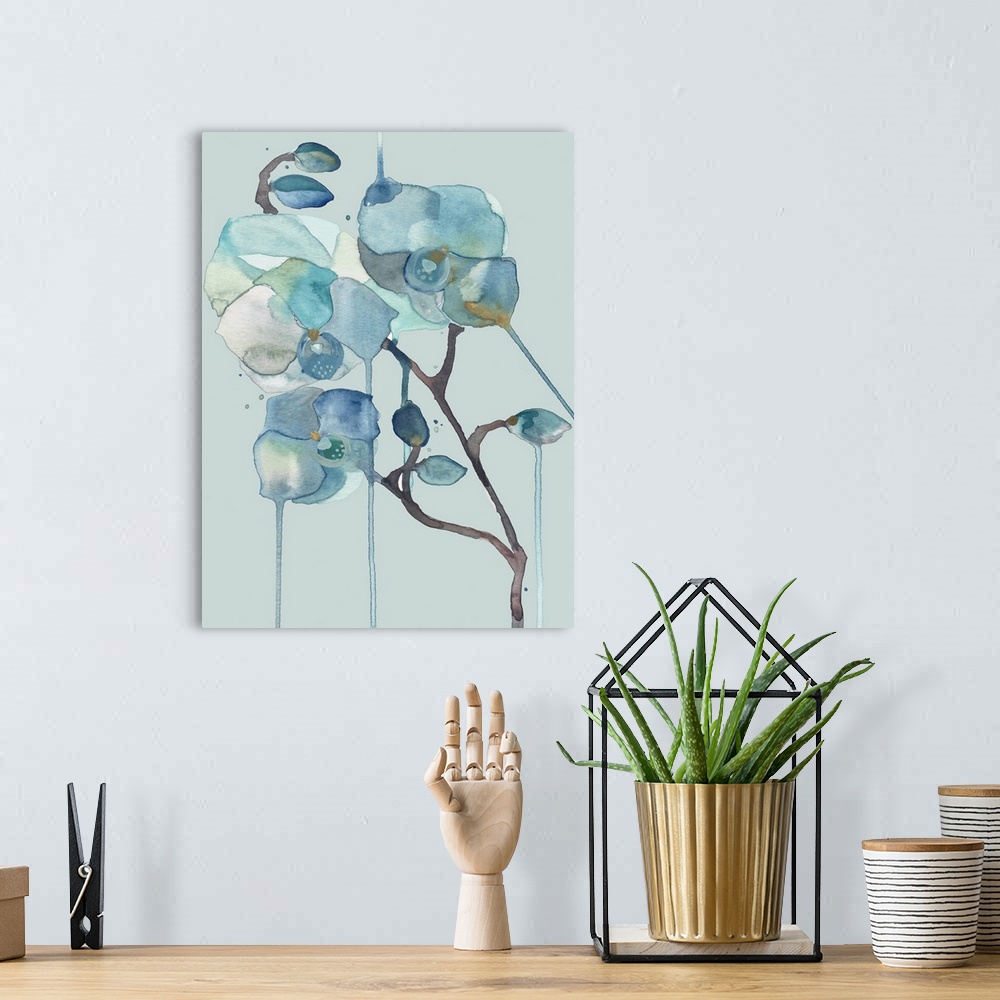 A bohemian room featuring Contemporary watercolor artwork of delicate blue orchid flowers on a light blue background.