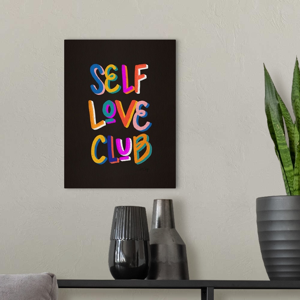 A modern room featuring Self Love Club
