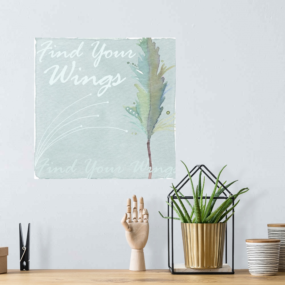 A bohemian room featuring Decorative watercolor painting of a feather in green tones with the words "Find your wings."