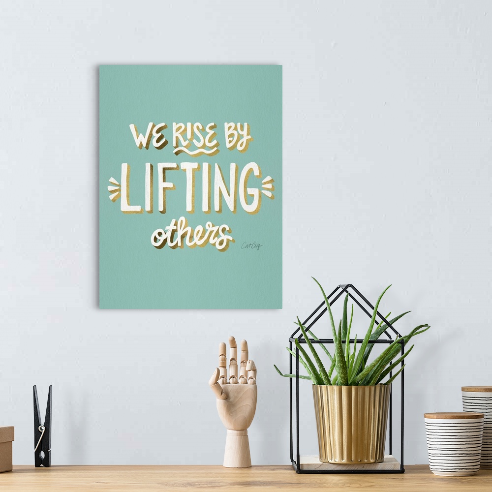 A bohemian room featuring We Rise By Lifting Others
