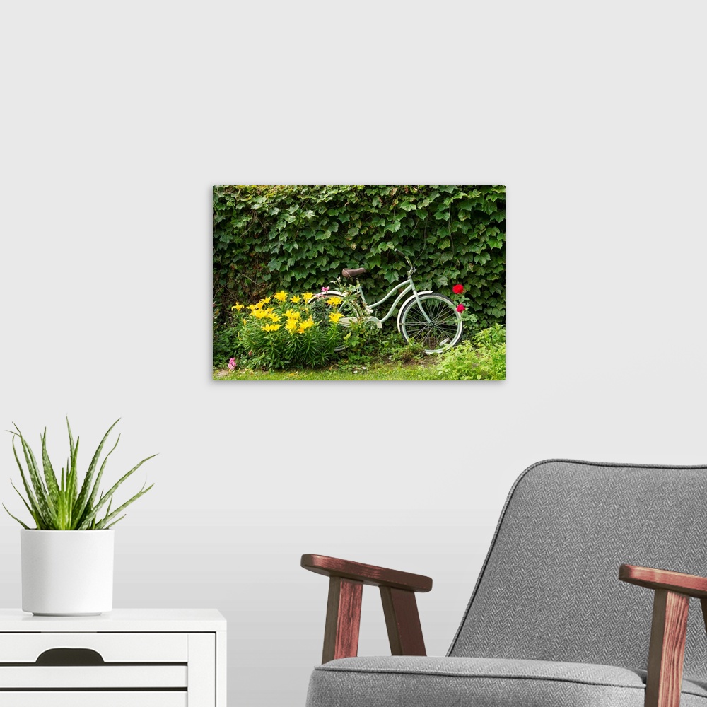 A modern room featuring A bicycle in a beautiful garden.