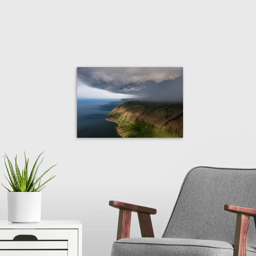 A modern room featuring A thunderstorm moves over the eastern shore of Lake Albert.