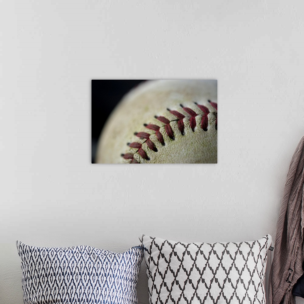 A bohemian room featuring Detail shot of a baseball.