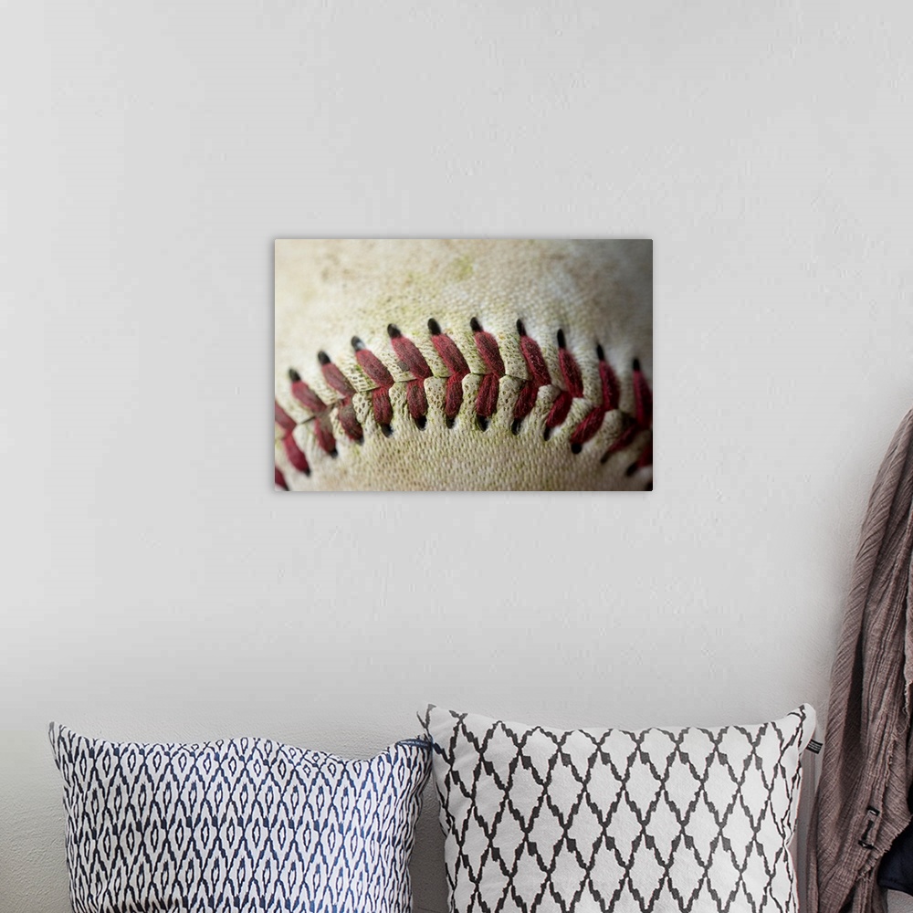 A bohemian room featuring Detail shot of a baseball.