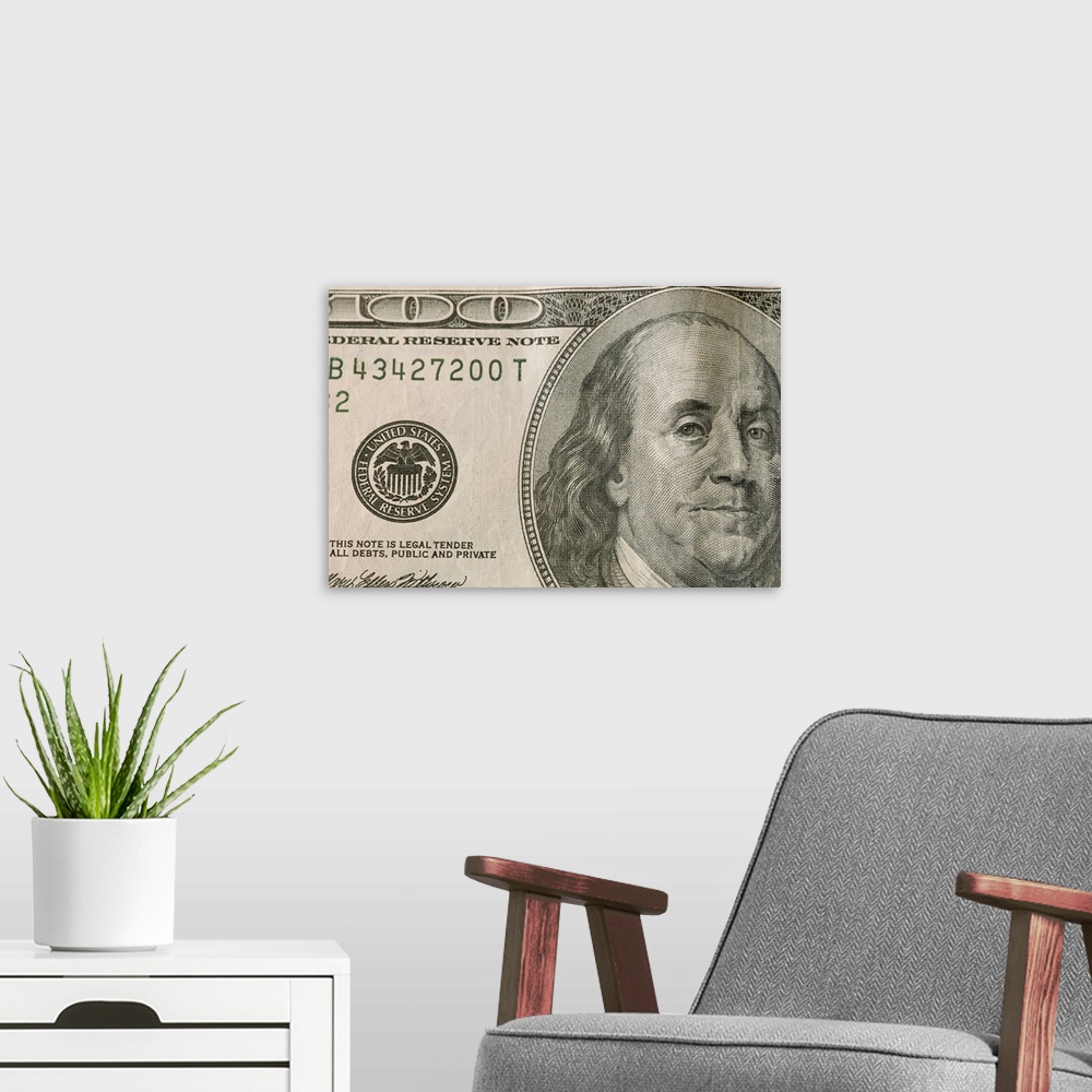 A modern room featuring Portrait of Benjamin Franklin on the one hundred dollar bill.
