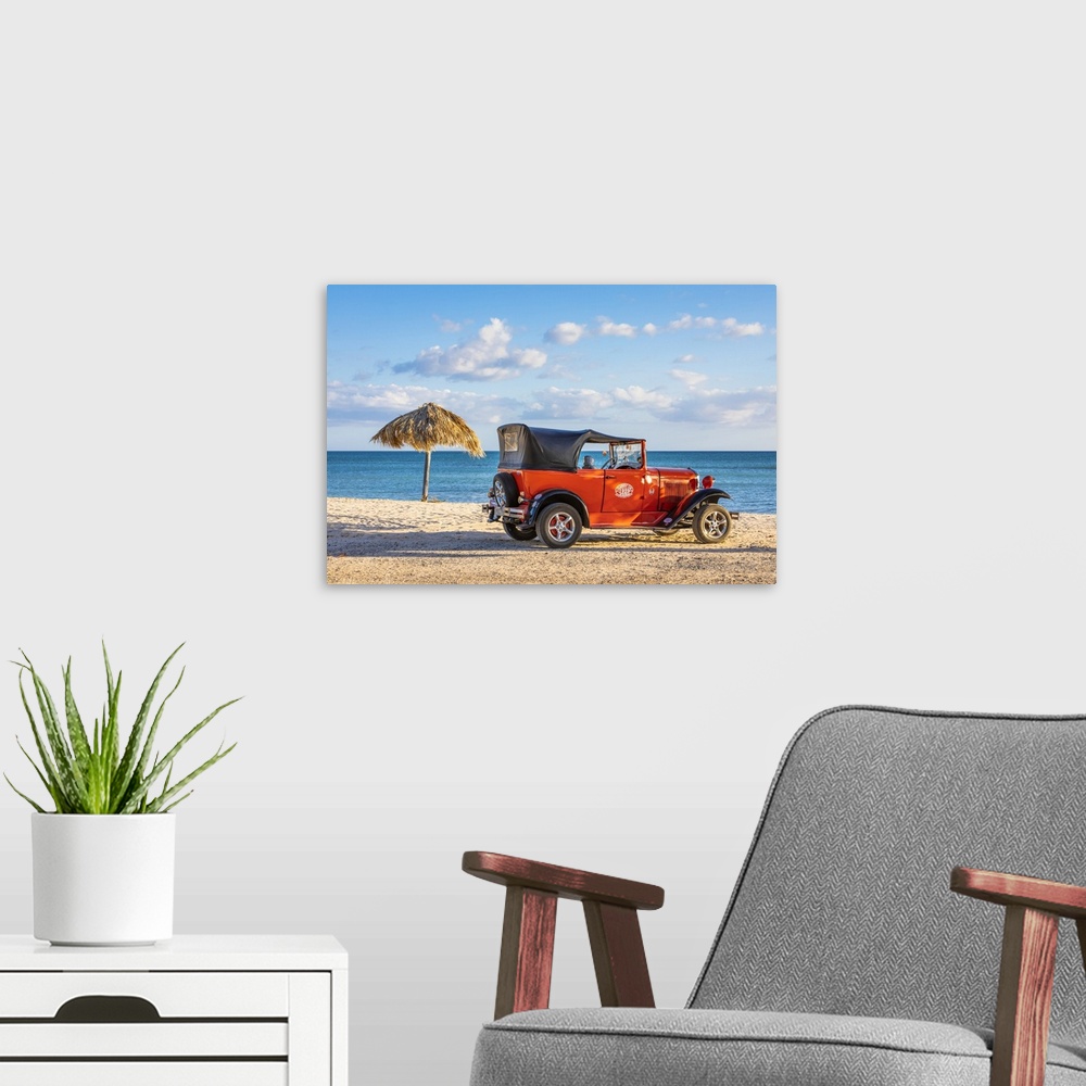 A modern room featuring A classic car on a beach in Playa Ancoa, in Trinidad, Sancti Spiritus, Cuba