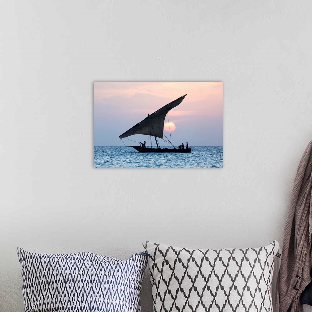 A bohemian room featuring A Dhow Sails In Front Of The Setting Sun, Stone Tpwn, Zanzibar, Tanzania