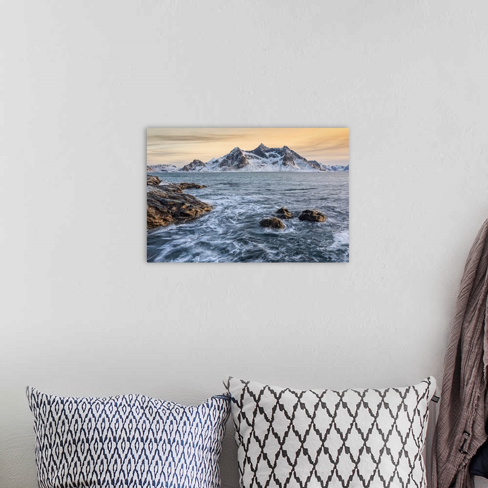 A bohemian room featuring A magical winter sunset around Flakstad beach, Lofoten Islands, Northern Norway