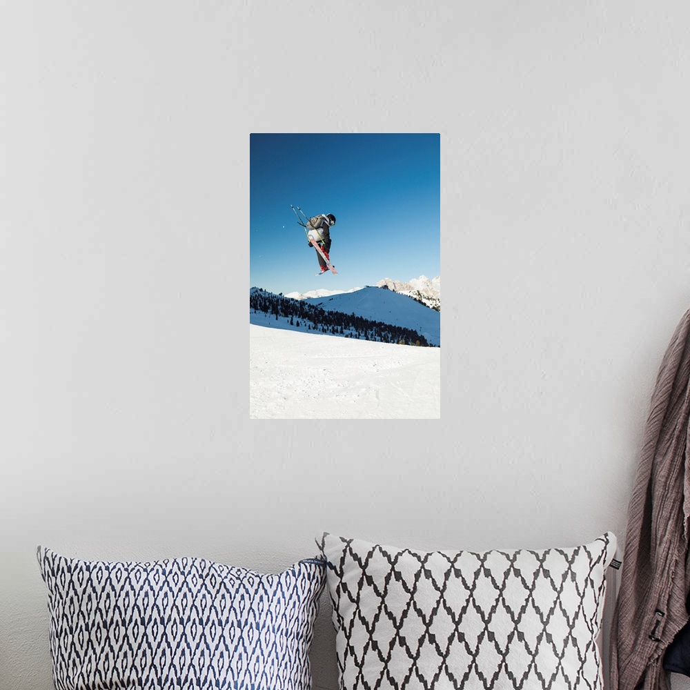 A bohemian room featuring A View Of A Freestyler Flying With His Skis After A Jump In Val Gardena, Bolzano Province, South ...