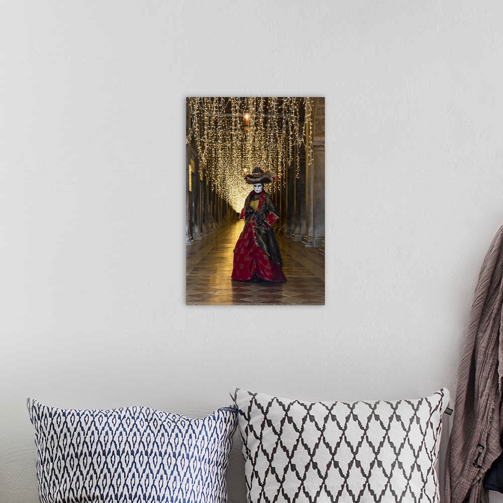 A bohemian room featuring A woman in costume poses in St. Mark's square during the Venice Carnival, Venice, Veneto, Italy