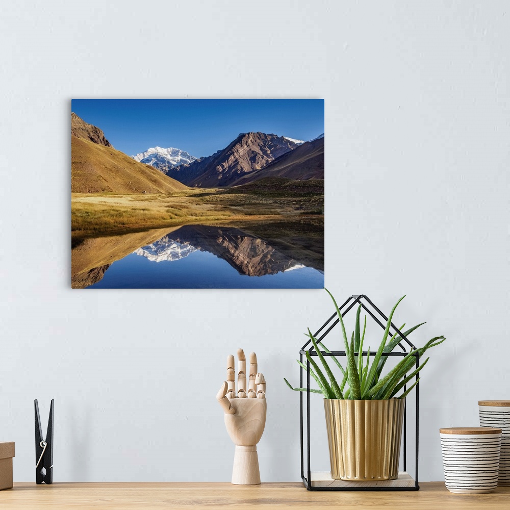 A bohemian room featuring Aconcagua Mountain reflecting in the Espejo Lagoon, Aconcagua Provincial Park, Central Andes, Men...