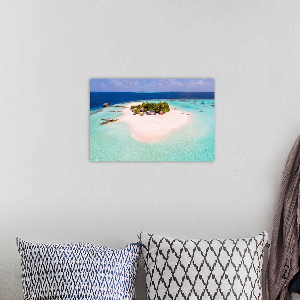 A bohemian room featuring Aerial Drone View Of A Tropical Island, Maldives