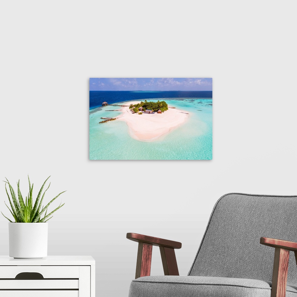 A modern room featuring Aerial Drone View Of A Tropical Island, Maldives