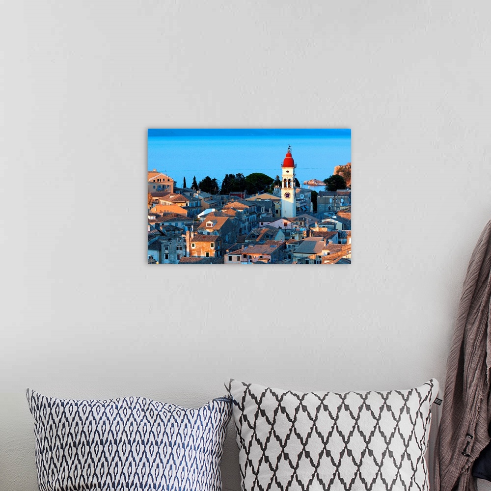 A bohemian room featuring Aerial view from New fortress on the city with St. Spyridon church before sunset, Kerkyra, Corfu ...