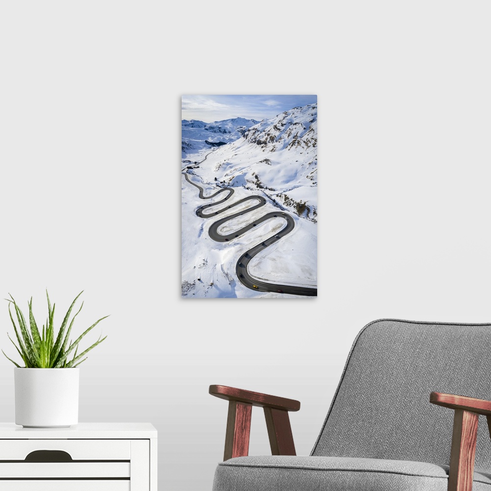 A modern room featuring Aerial view of curves of Maloja Pass road, Bregaglia Valley, canton of Graubunden, Engadine, Swit...