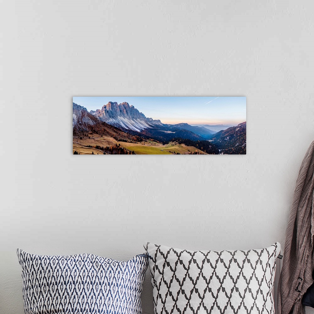 A bohemian room featuring Aerial view of Odle peaks (Geisler gruppe) at sunrise, Funes valley, Dolomites, Italy
