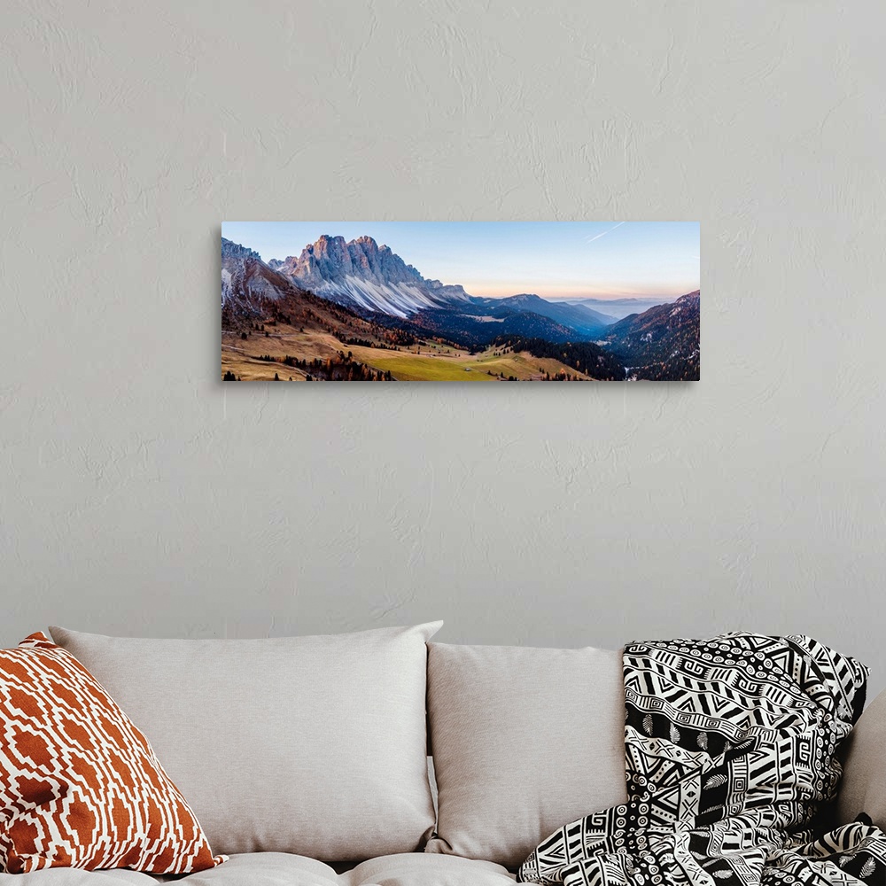 A bohemian room featuring Aerial view of Odle peaks (Geisler gruppe) at sunrise, Funes valley, Dolomites, Italy