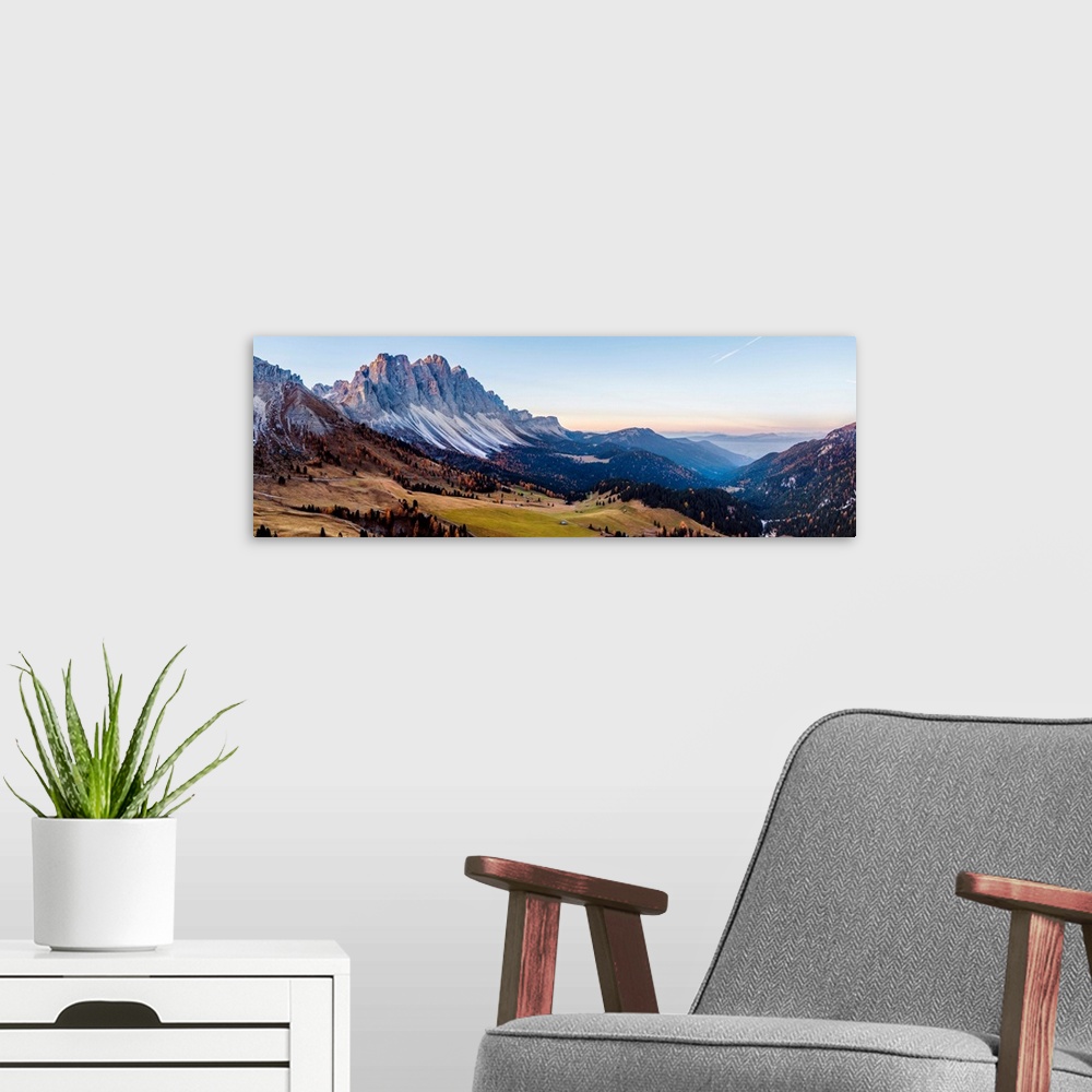 A modern room featuring Aerial view of Odle peaks (Geisler gruppe) at sunrise, Funes valley, Dolomites, Italy