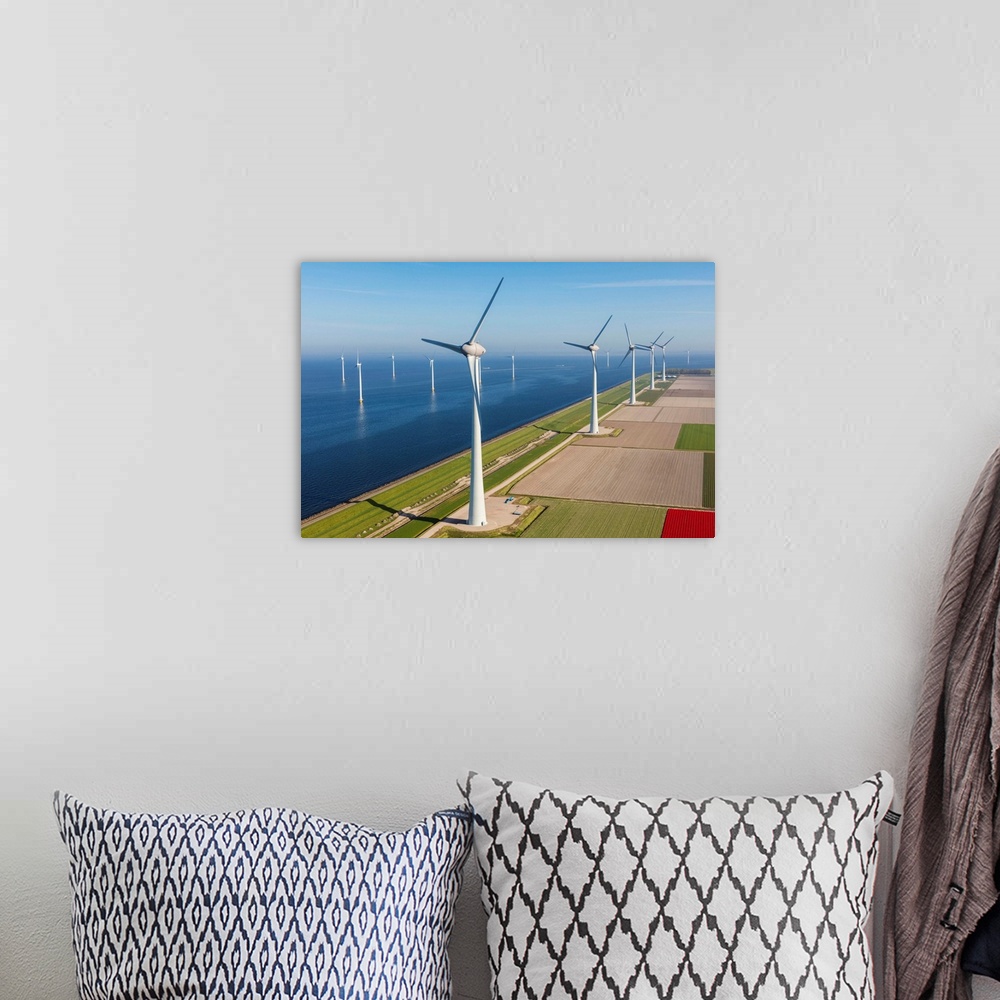 A bohemian room featuring Aerial view of wind turbines at sea, North Holland, Netherlands