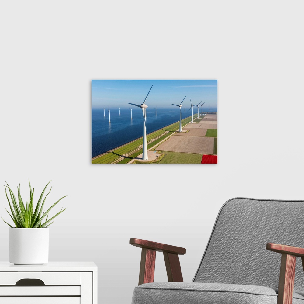 A modern room featuring Aerial view of wind turbines at sea, North Holland, Netherlands