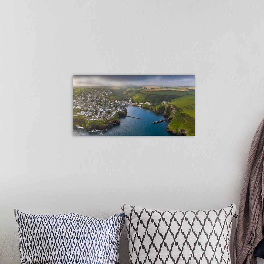 A bohemian room featuring Aerial vista of Port Isaac on the North coast of Cornwall, England. Summer (August) 2020.