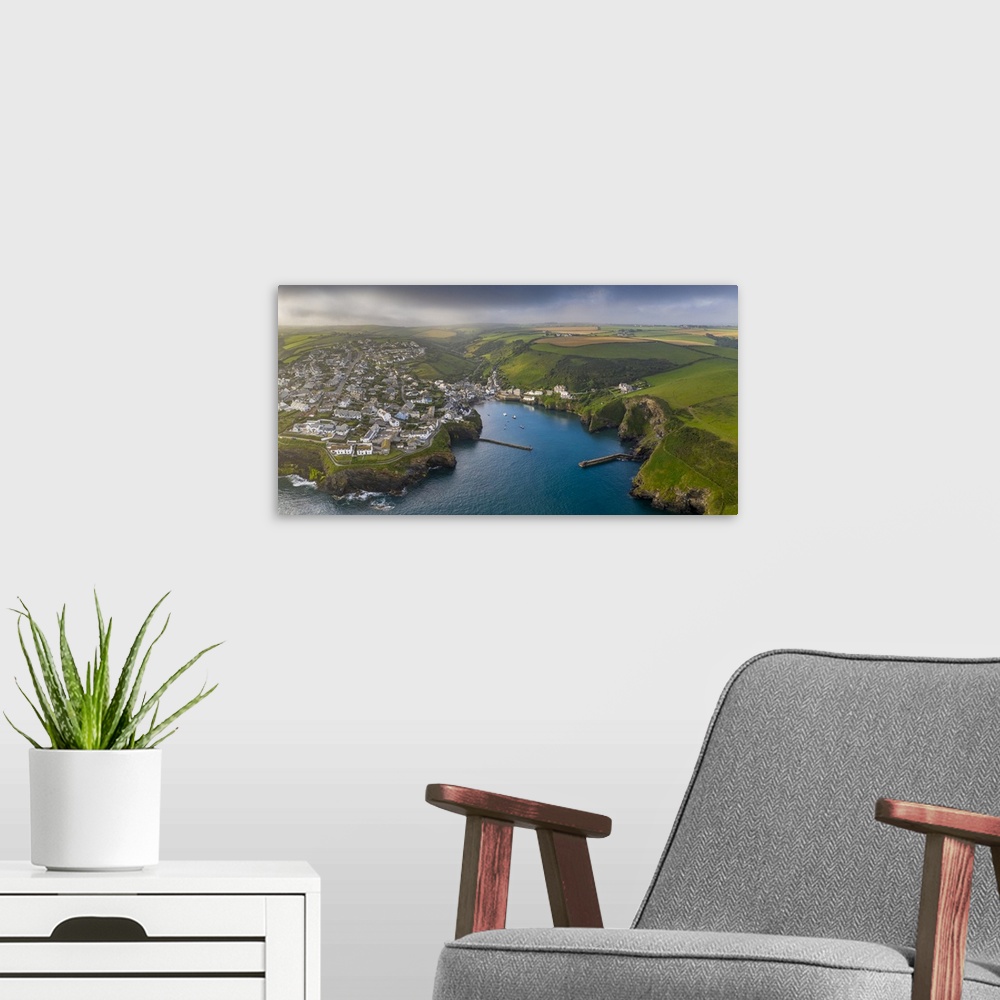 A modern room featuring Aerial vista of Port Isaac on the North coast of Cornwall, England. Summer (August) 2020.