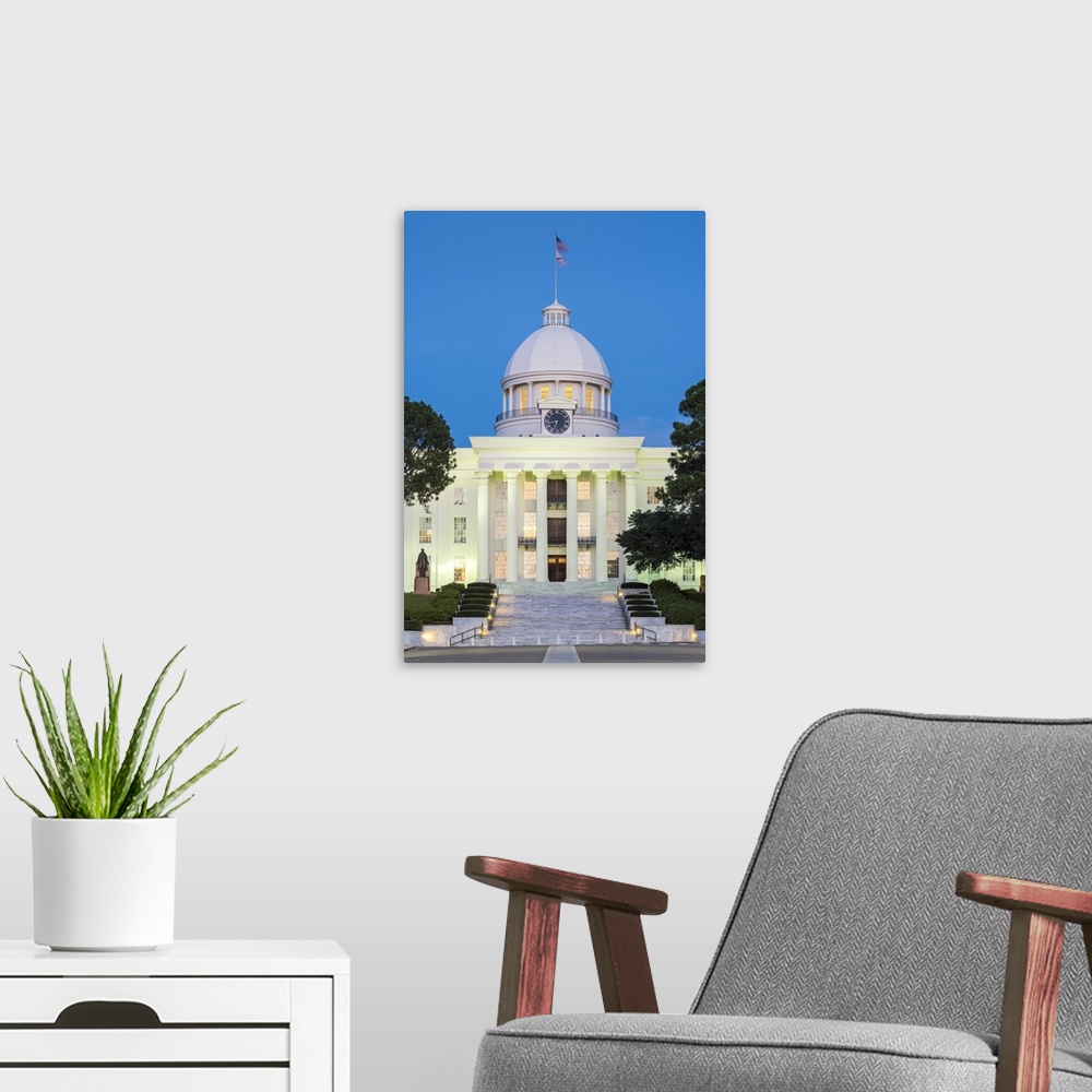 A modern room featuring United States, Alabama, Montgomery. Alabama State Capitol building at dusk, former First Confeder...