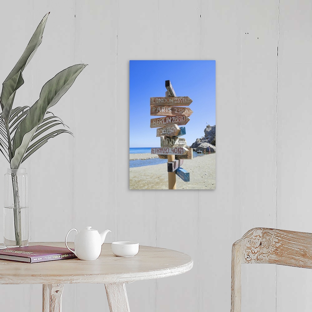 A farmhouse room featuring All directions sign post on beach, Preveli beach, Rethymno, Crete, Greek Islands, Greece