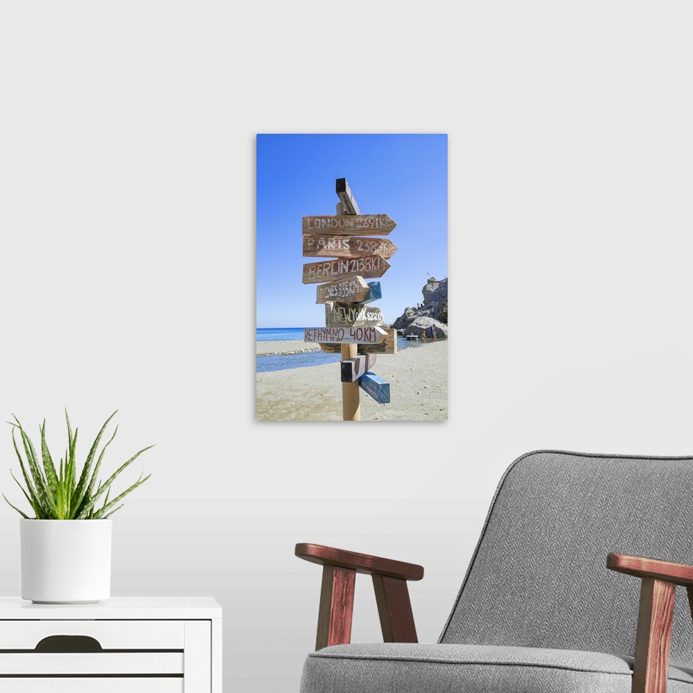 A modern room featuring All directions sign post on beach, Preveli beach, Rethymno, Crete, Greek Islands, Greece