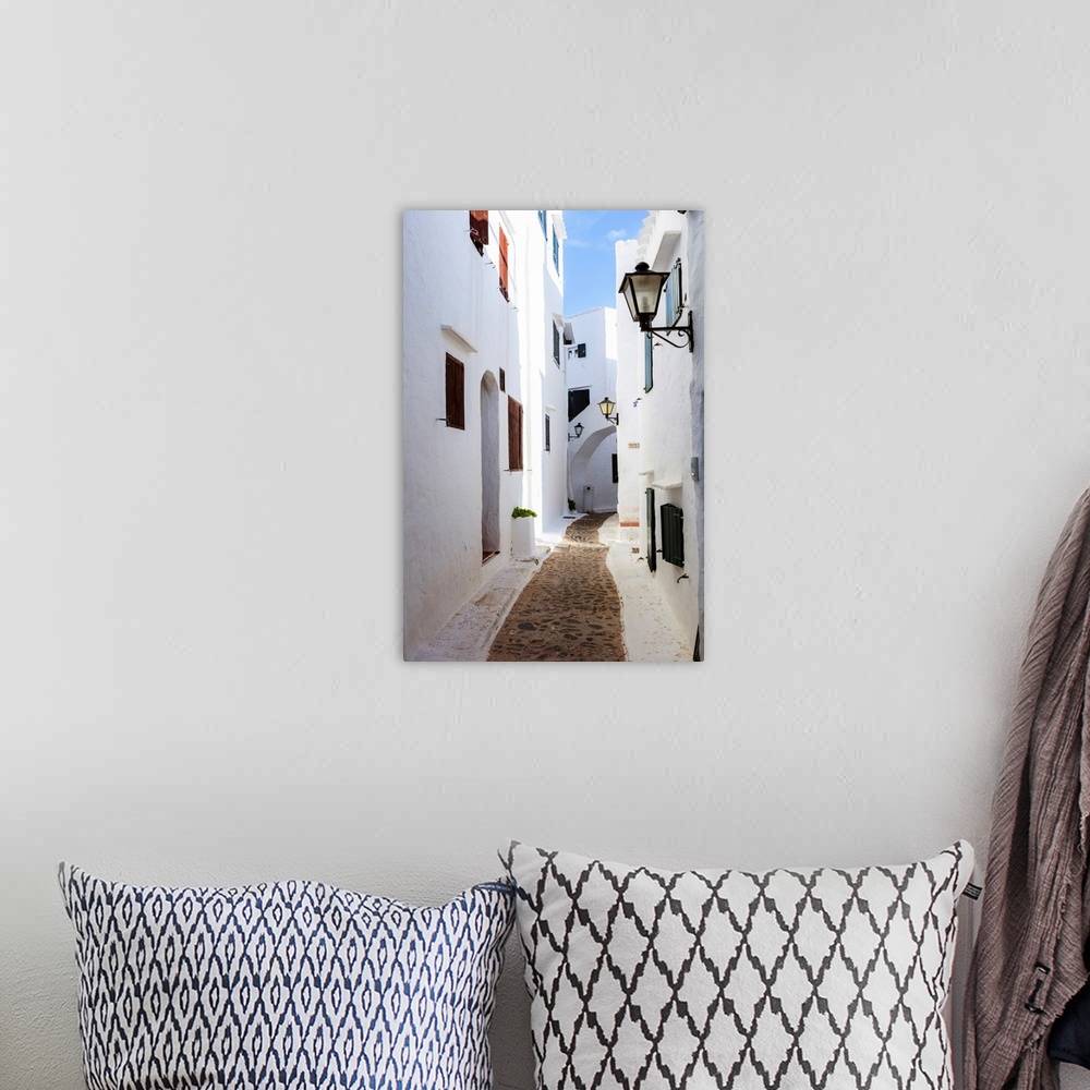 A bohemian room featuring Alley in the old town of Binibequer Vell, Menorca, Balearic Islands, Spain.