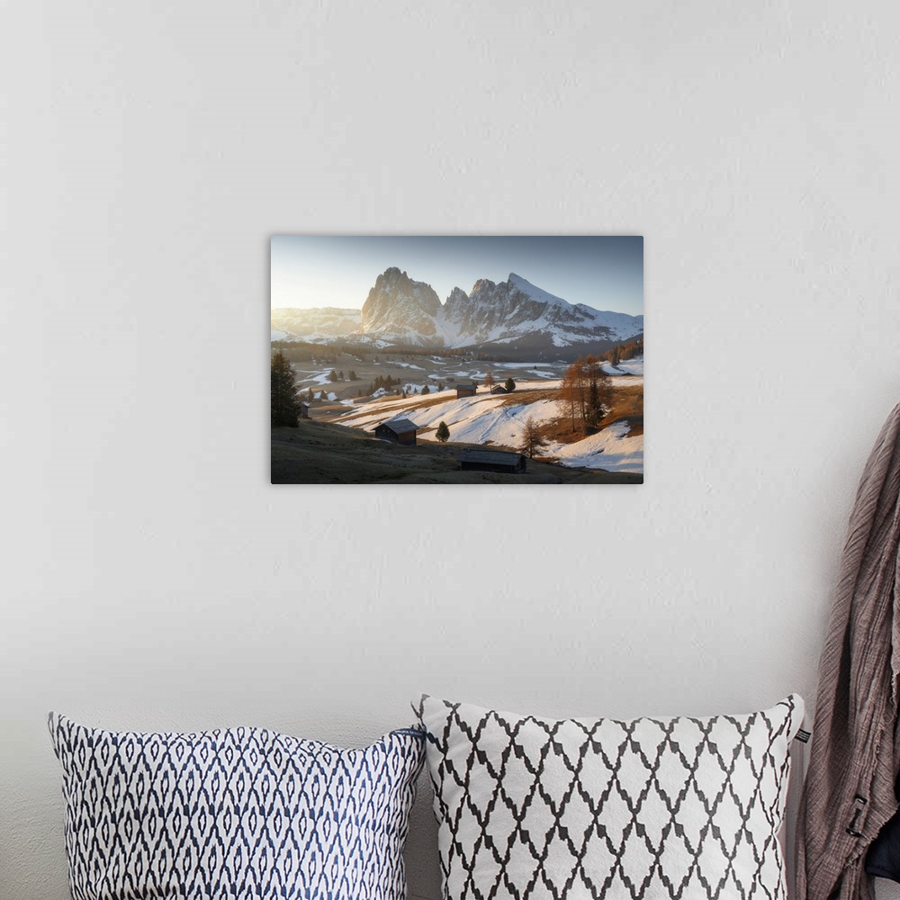 A bohemian room featuring Alpe di Siusi during an early spring morning, with the snow slowly melting, Dolomites, Italy