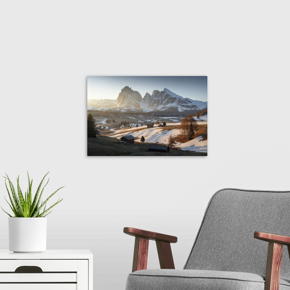 A modern room featuring Alpe di Siusi during an early spring morning, with the snow slowly melting, Dolomites, Italy