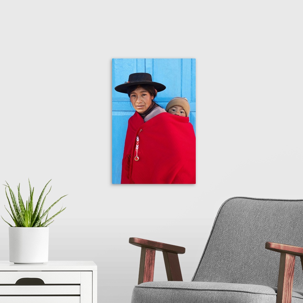 A modern room featuring Portrait of an Aymara mother in traditional clothes with her child standing in front of the antiq...