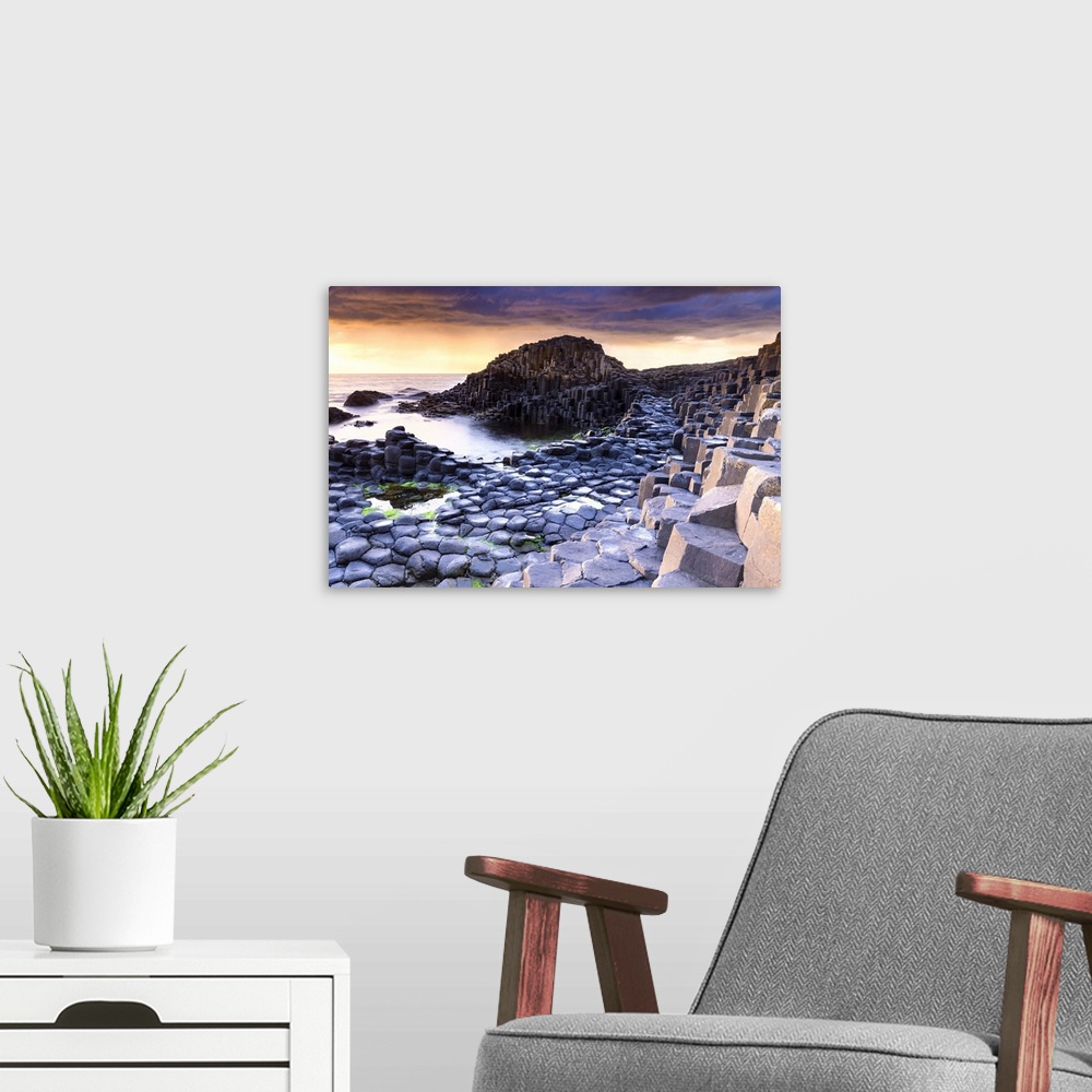 A modern room featuring An epic sunset at the Giant's Causeway with it's iconic basalt columns. County Antrim, Ulster reg...
