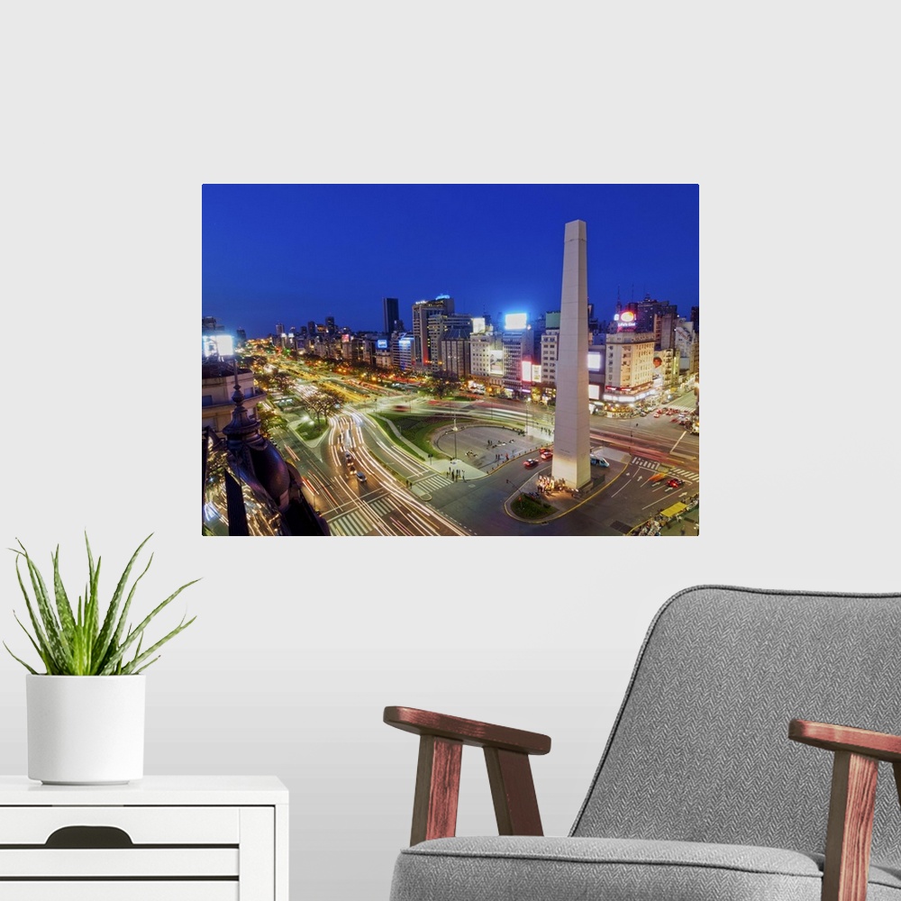 A modern room featuring Argentina, Buenos Aires Province, City of Buenos Aires, Twilight view of 9 de Julio Avenue, Plaza...