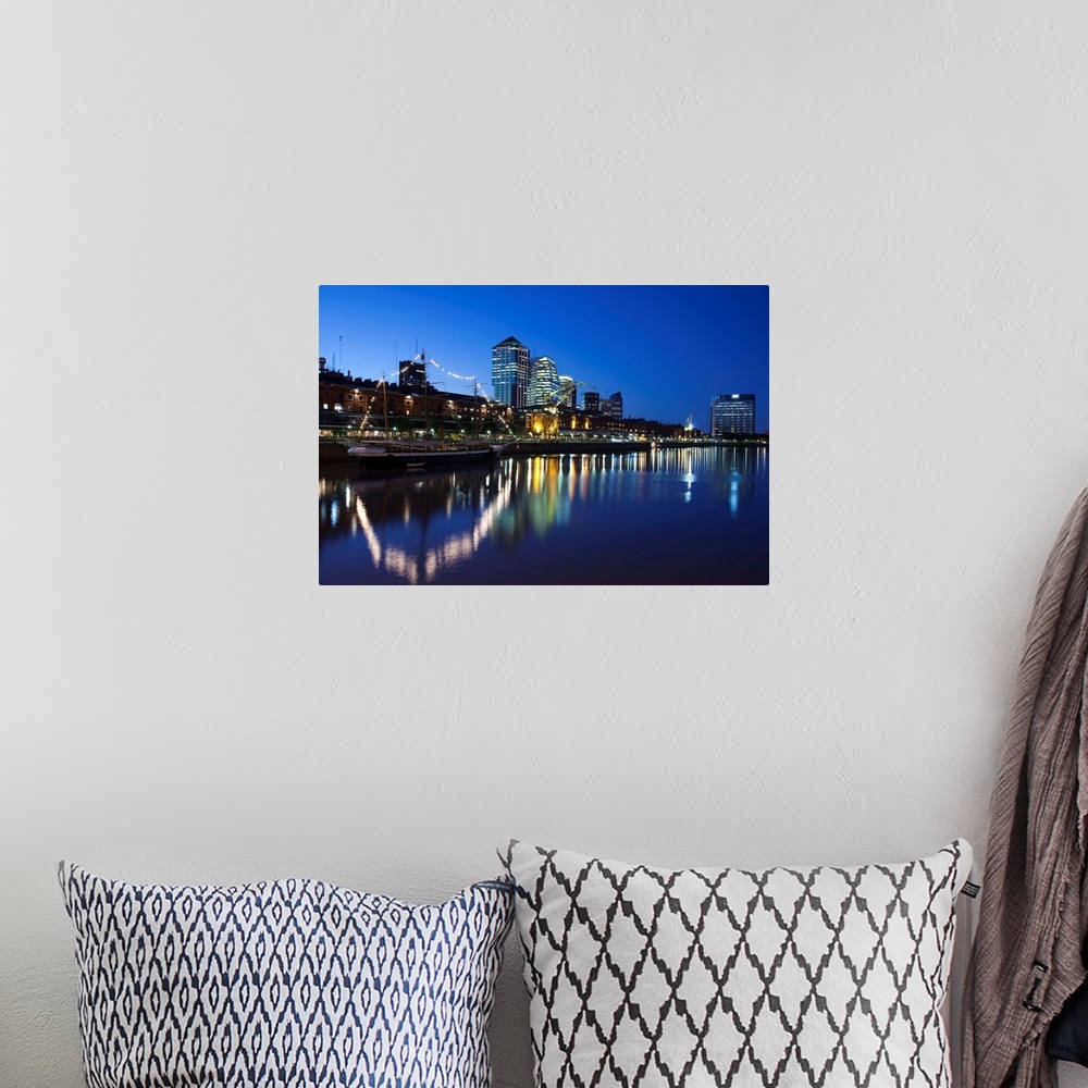 A bohemian room featuring Argentina, Buenos Aires, Puerto Madero, highrise buildings, dusk