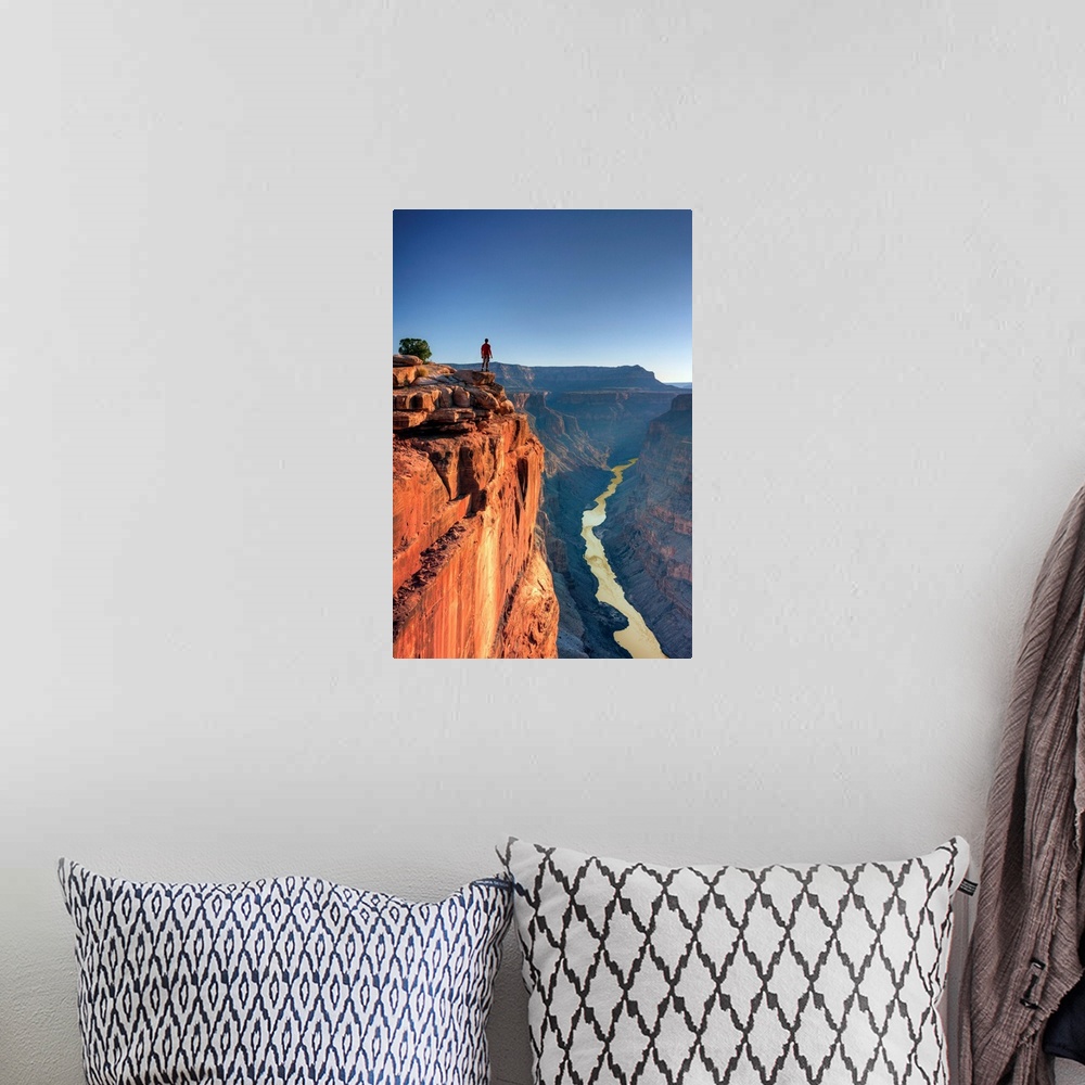 A bohemian room featuring USA, Arizona, Grand Canyon National Park (North Rim), Toroweap (Tuweep) Overlook, Hiker on cliff ...