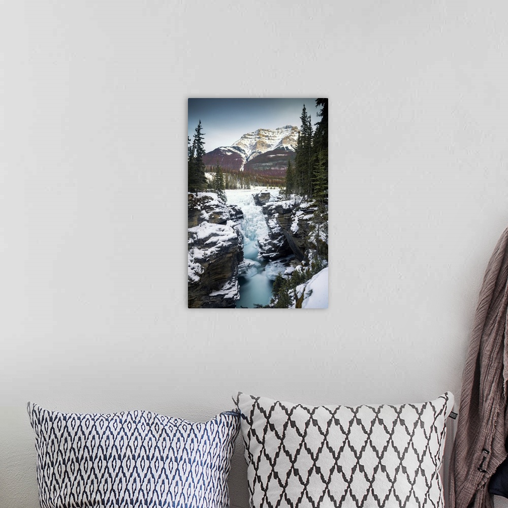 A bohemian room featuring Athabasca Falls in Winter,  Alberta, Canada.